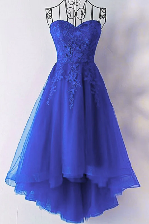 Blue dress with lace details on a white background