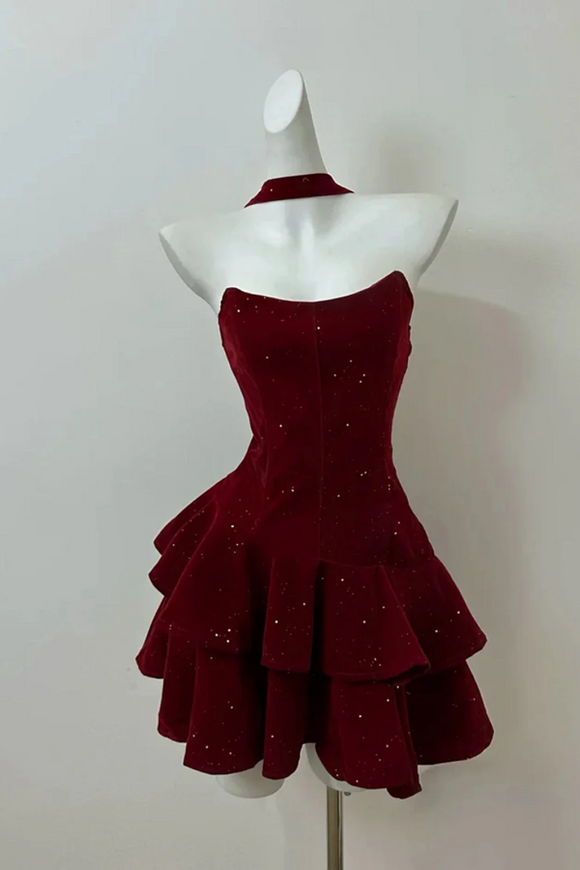 Red dress on a mannequin against a white background