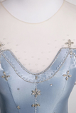 Light blue dress with floral embellishments on a mannequin against a white background
