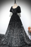 Black sequin evening gown on a mannequin against a neutral background