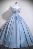 Light blue evening gown on a mannequin against a plain background