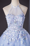 Blue floral dress on a mannequin against a dark background