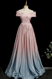 Pink to blue gradient evening gown on a mannequin against a black background