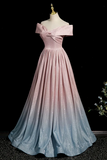 Pink and blue gradient evening gown on a mannequin against a black background