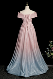 Pink and blue gradient evening gown on a mannequin against a black background