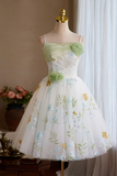 Floral dress on a mannequin against a neutral background