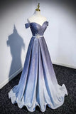 An off-the-shoulder A-line formal gown with a shimmering lavender-to-silver ombré gradient, displayed on a mannequin in an indoor setting.